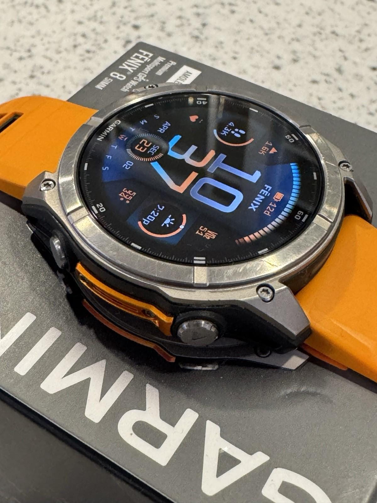 Garmin fenix 8 Amoled Sapphire 51 mm Watch Titanium w Spark Orange Silicone Band