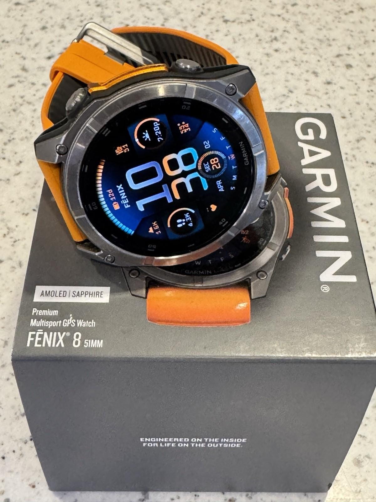 Garmin fenix 8 Amoled Sapphire 51 mm Watch Titanium w Spark Orange Silicone Band