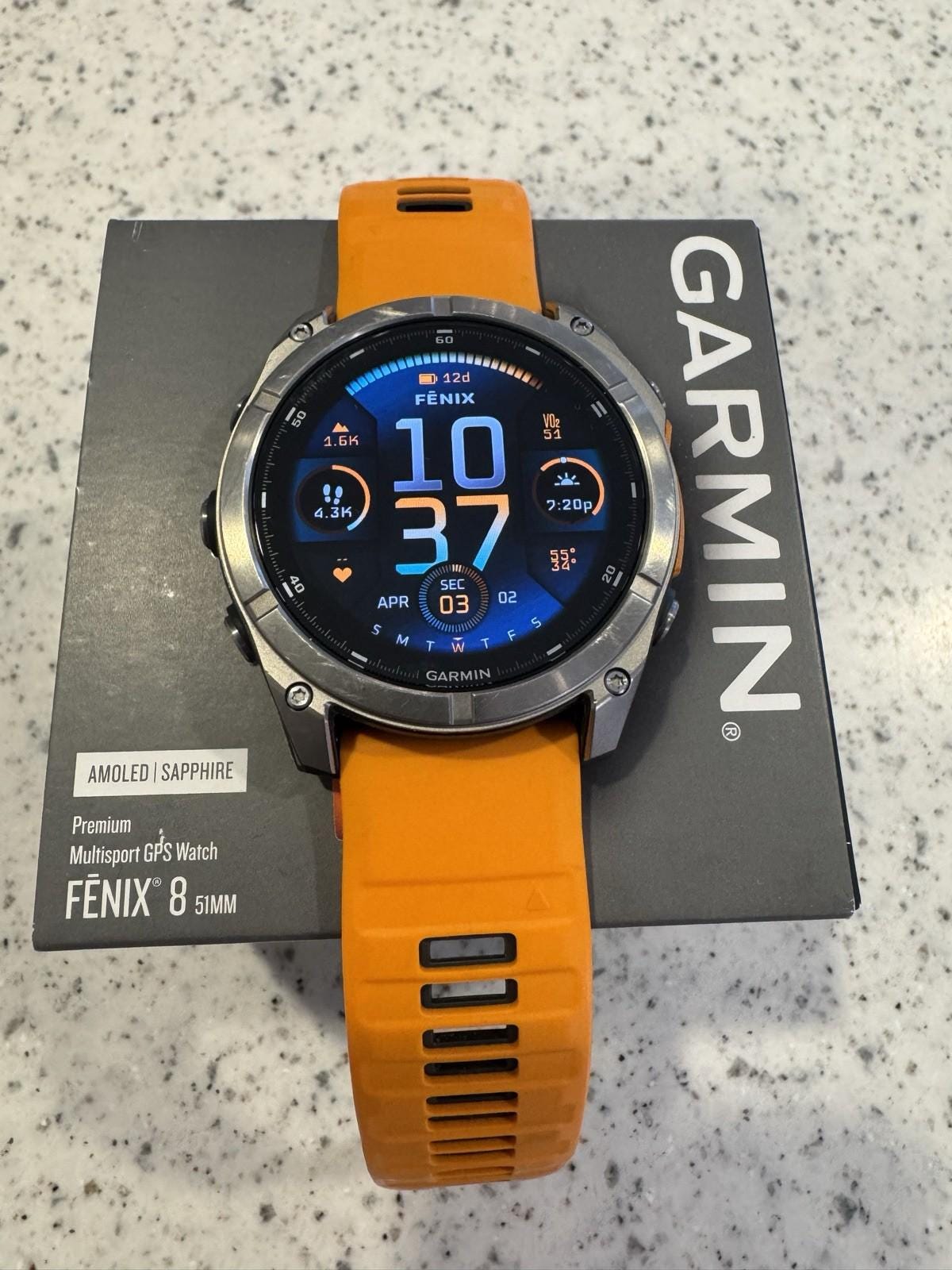 Garmin fenix 8 Amoled Sapphire 51 mm Watch Titanium w Spark Orange Silicone Band