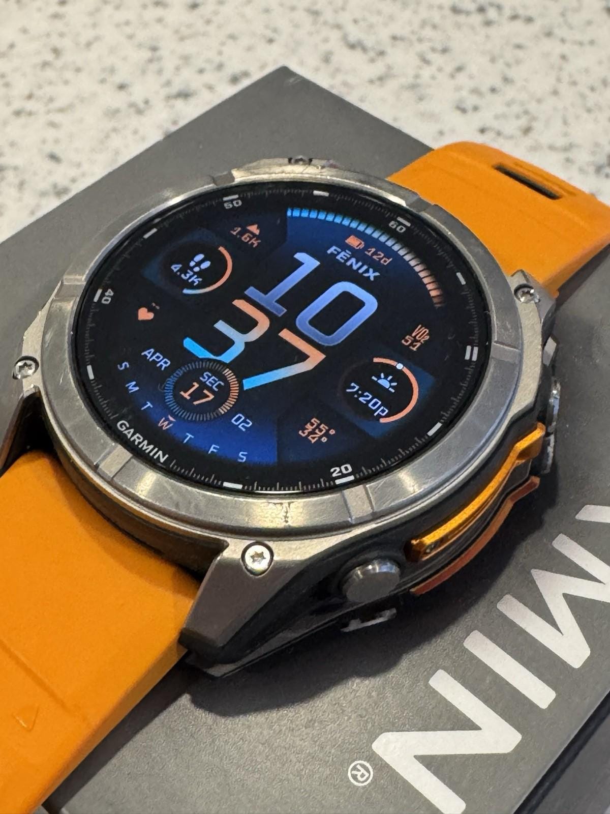 Garmin fenix 8 Amoled Sapphire 51 mm Watch Titanium w Spark Orange Silicone Band