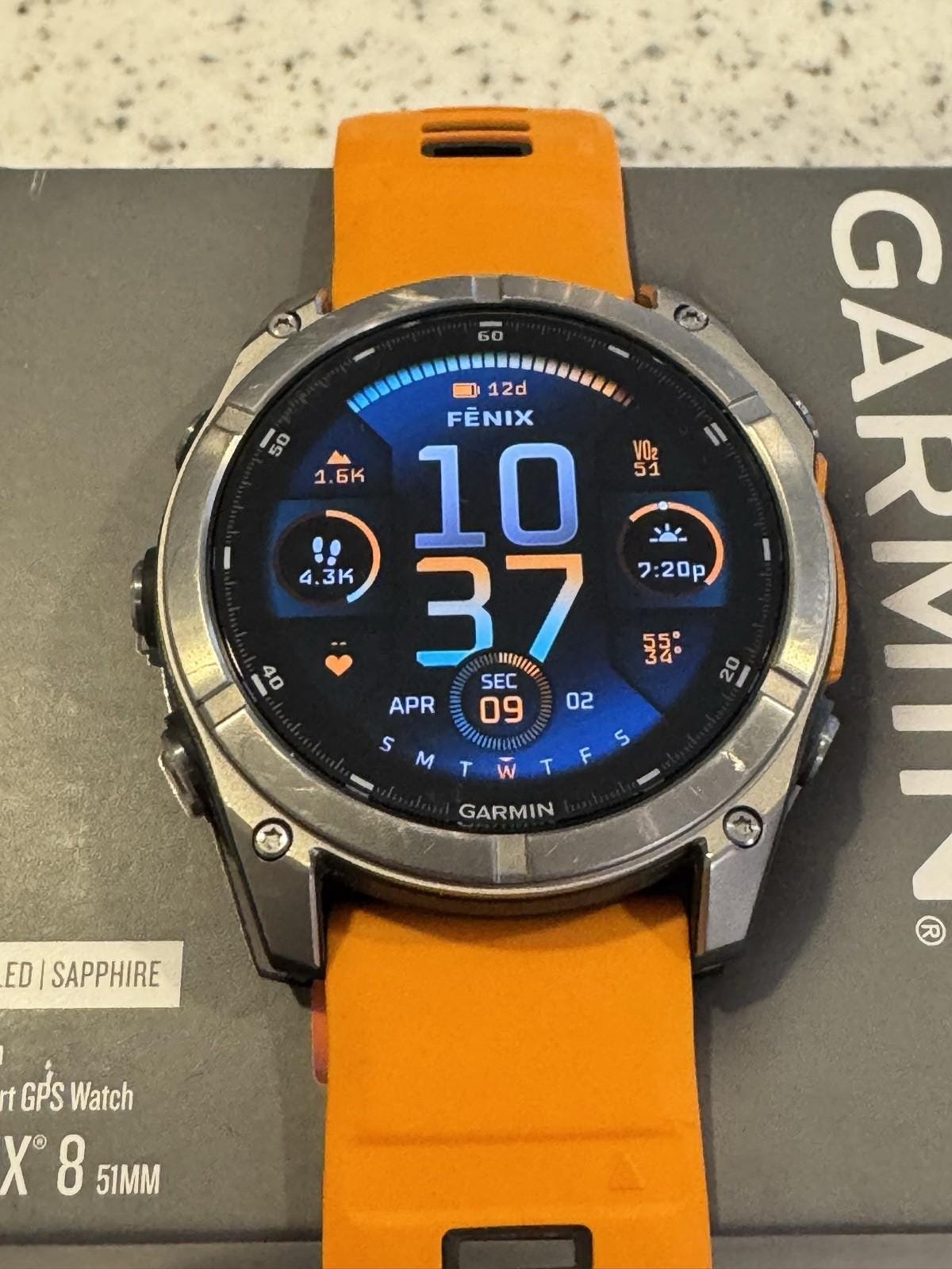 Garmin fenix 8 Amoled Sapphire 51 mm Watch Titanium w Spark Orange Silicone Band